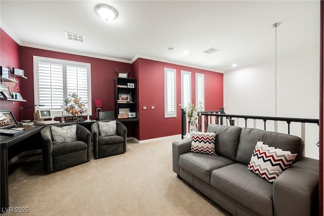 carpeted living room featuring baseboards, ornamental molding, and visible vents
