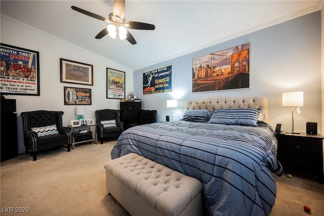bedroom with ceiling fan, carpet floors, ornamental molding, and lofted ceiling