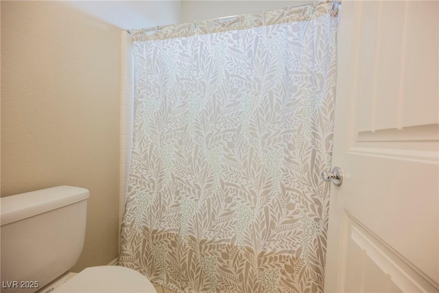 full bath featuring walk in shower and toilet