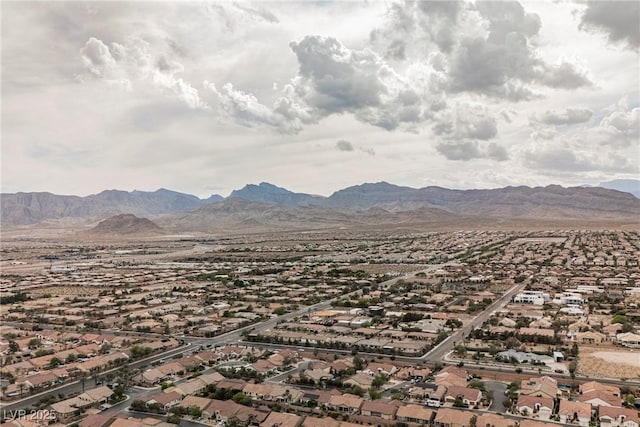 bird's eye view featuring a mountain view and a residential view