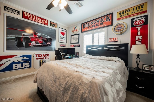 carpeted bedroom with a ceiling fan, baseboards, ornamental molding, and visible vents