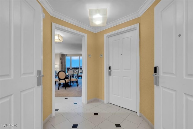 125 E Harmon Ave Unit 2220, Las Vegas, NV 89109 - entrance foyer with ornamental molding, light tile patterned floors, and baseboards