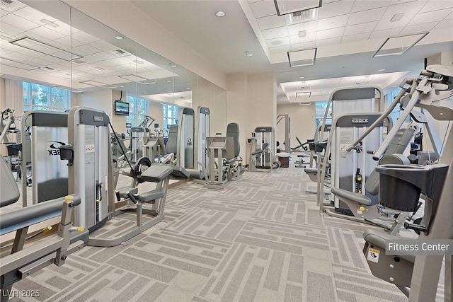 125 E Harmon Ave Unit 2220, Las Vegas, NV 89109 - workout area featuring plenty of natural light, carpet flooring, and a drop ceiling