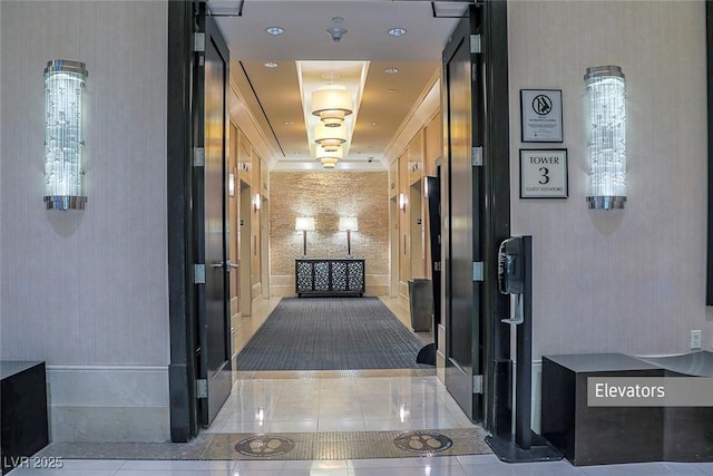 125 E Harmon Ave Unit 2220, Las Vegas, NV 89109 - hallway featuring tile patterned floors and a raised ceiling