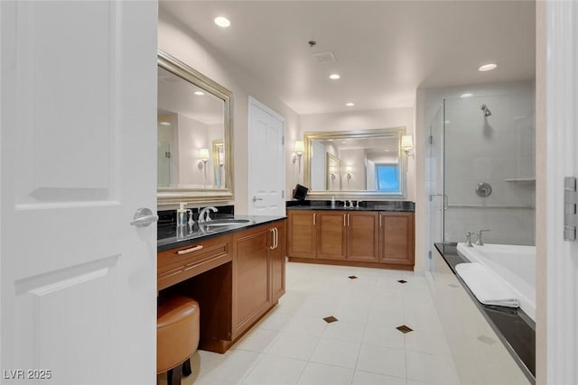 125 E Harmon Ave Unit 2220, Las Vegas, NV 89109 - bathroom featuring recessed lighting, tile patterned flooring, a tub to relax in, a sink, and a stall shower