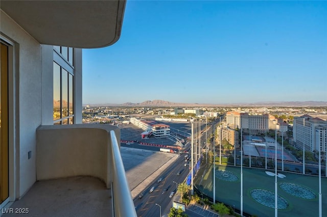 125 E Harmon Ave Unit 2220, Las Vegas, NV 89109 - balcony featuring a view of city and a mountain view