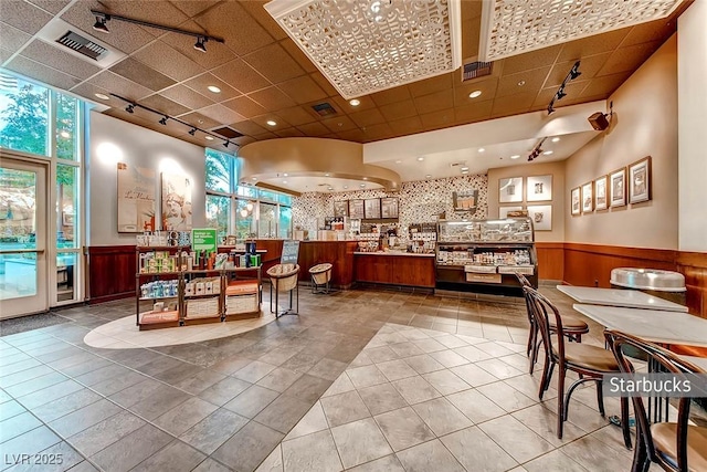 145 E Harmon Ave Unit 2411, Las Vegas, NV 89109 - welcome area featuring a wainscoted wall, a paneled ceiling, and recessed lighting