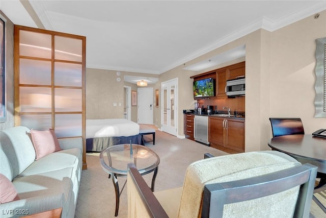 145 E Harmon Ave Unit 2411, Las Vegas, NV 89109 - living area with crown molding, french doors, and light carpet