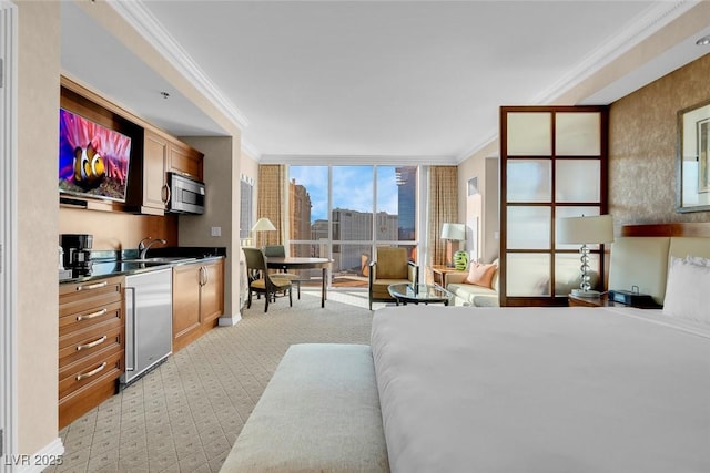 145 E Harmon Ave Unit 2411, Las Vegas, NV 89109 - bedroom featuring ornamental molding, light carpet, a wall of windows, and a sink