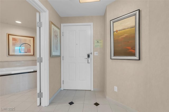 145 E Harmon Ave Unit 2411, Las Vegas, NV 89109 - entrance foyer featuring baseboards and light tile patterned floors