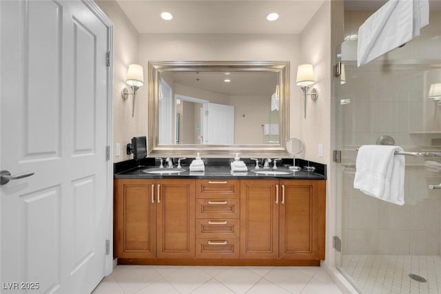 145 E Harmon Ave Unit 2411, Las Vegas, NV 89109 - full bathroom with a stall shower, double vanity, tile patterned flooring, and recessed lighting