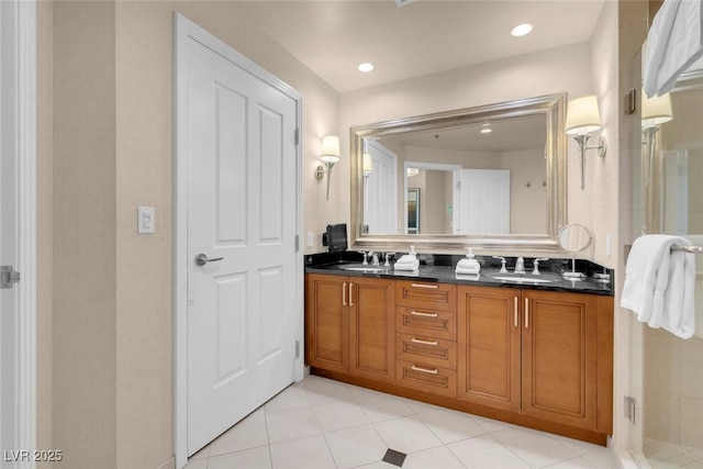 145 E Harmon Ave Unit 2411, Las Vegas, NV 89109 - bathroom with double vanity, tile patterned flooring, and a stall shower