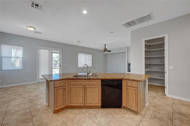 kitchen with visible vents, a sink, a ceiling fan, and black dishwasher
