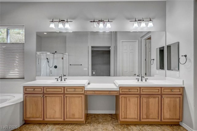 full bathroom featuring a sink, double vanity, a shower stall, and a bath