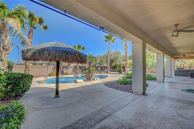 8370 Unicorn St, Las Vegas, NV 89131 - fenced backyard featuring ceiling fan and a patio area