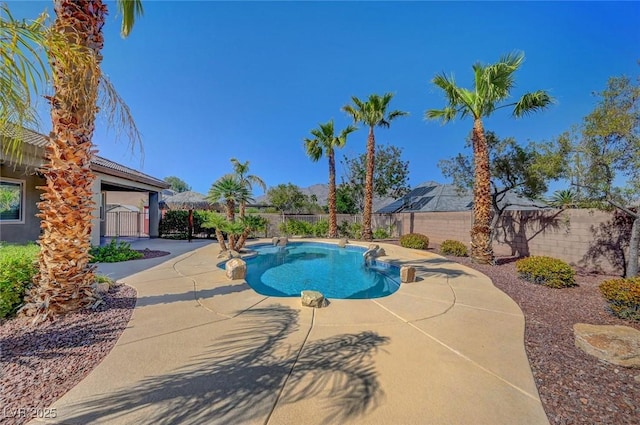 8370 Unicorn St, Las Vegas, NV 89131 - view of pool featuring a patio area and a fenced backyard