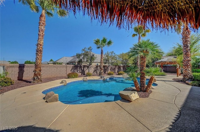 8370 Unicorn St, Las Vegas, NV 89131 - view of pool with a gazebo, a patio, and a fenced backyard