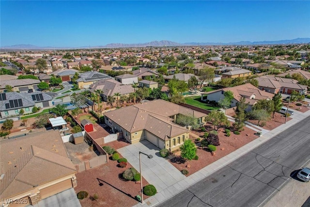 aerial view featuring a mountain view and a residential view