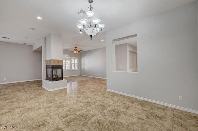 unfurnished living room with recessed lighting, baseboards, visible vents, and ceiling fan with notable chandelier
