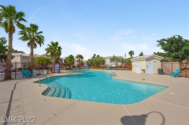 2509 April Breeze Ln, Henderson, NV 89002 - pool featuring a patio, central AC unit, and fence