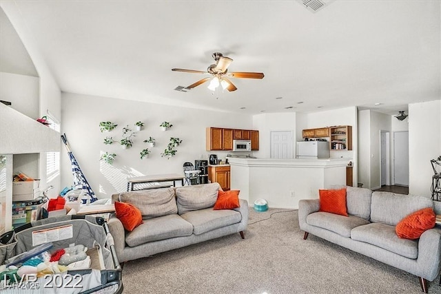2509 April Breeze Ln, Henderson, NV 89002 - living area with light carpet, a ceiling fan, and visible vents