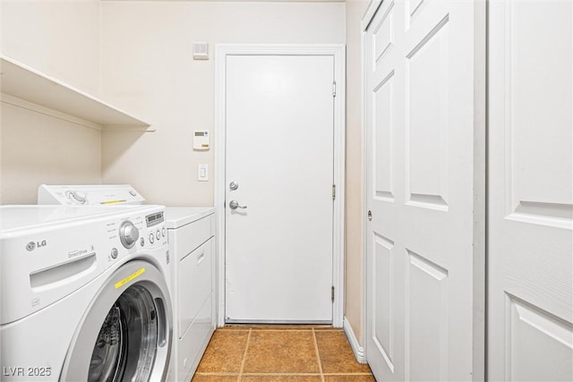 9539 Iris Flat Ct, Las Vegas, NV 89178 - laundry area featuring washer and clothes dryer and light tile patterned floors