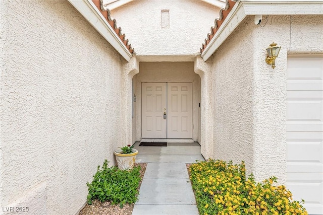 9539 Iris Flat Ct, Las Vegas, NV 89178 - property entrance with stucco siding