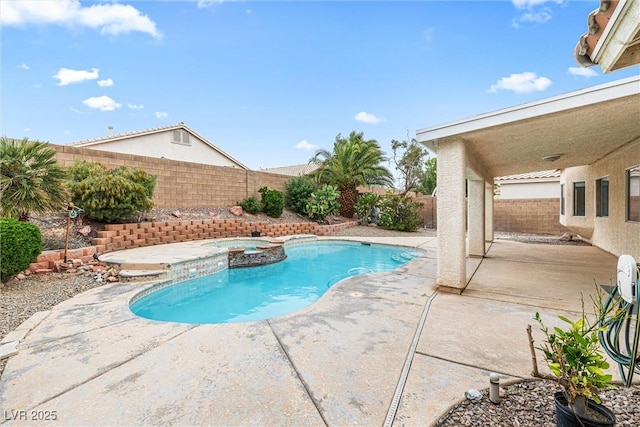 9539 Iris Flat Ct, Las Vegas, NV 89178 - view of swimming pool with a patio area, a fenced backyard, and a pool with connected hot tub