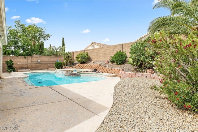 9539 Iris Flat Ct, Las Vegas, NV 89178 - view of swimming pool with a fenced backyard, a patio area, and a pool with connected hot tub