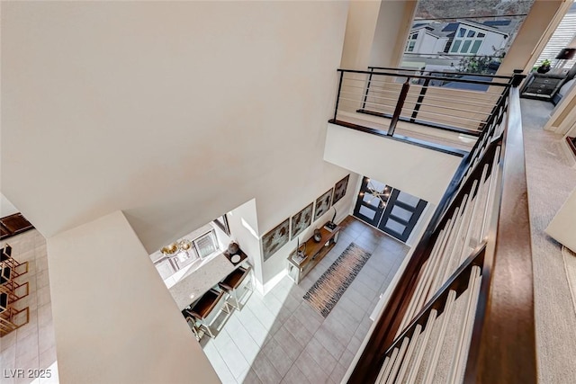 interior space with a high ceiling