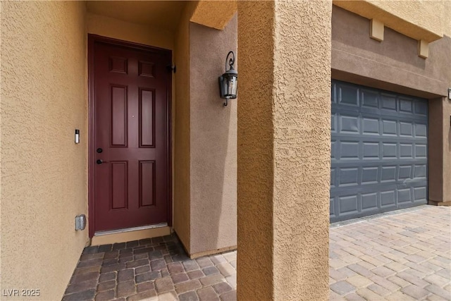 5317 Golden Melody Ln, North Las Vegas, NV 89081 - view of exterior entry with stucco siding