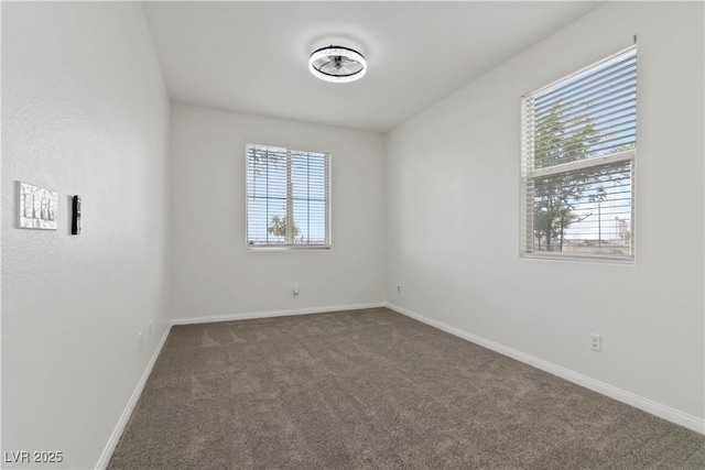 5317 Golden Melody Ln, North Las Vegas, NV 89081 - carpeted empty room with baseboards