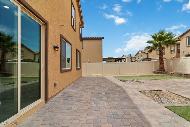 5317 Golden Melody Ln, North Las Vegas, NV 89081 - fenced backyard featuring a patio area