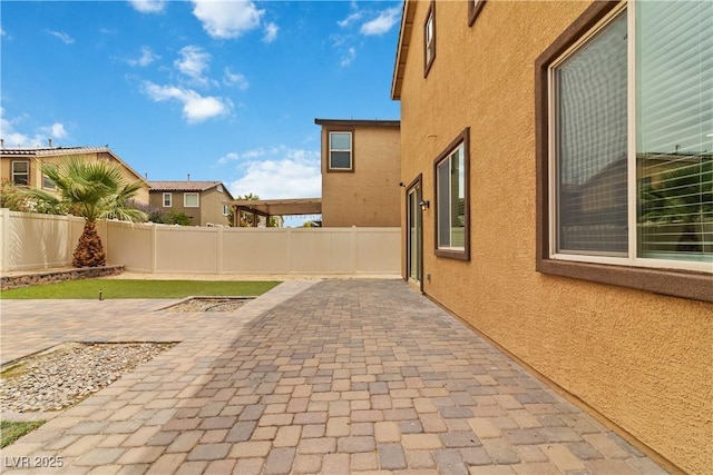 5317 Golden Melody Ln, North Las Vegas, NV 89081 - fenced backyard featuring a patio area