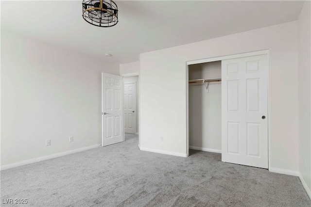 5317 Golden Melody Ln, North Las Vegas, NV 89081 - unfurnished bedroom featuring carpet, baseboards, and a closet