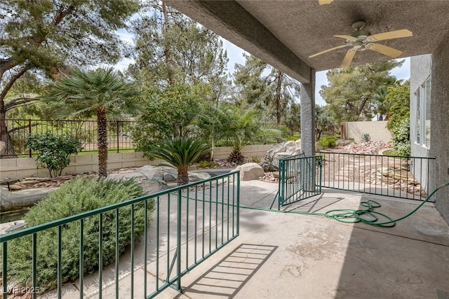 9705 Floweret Ave, Las Vegas, NV 89117 - fenced backyard featuring ceiling fan and a patio