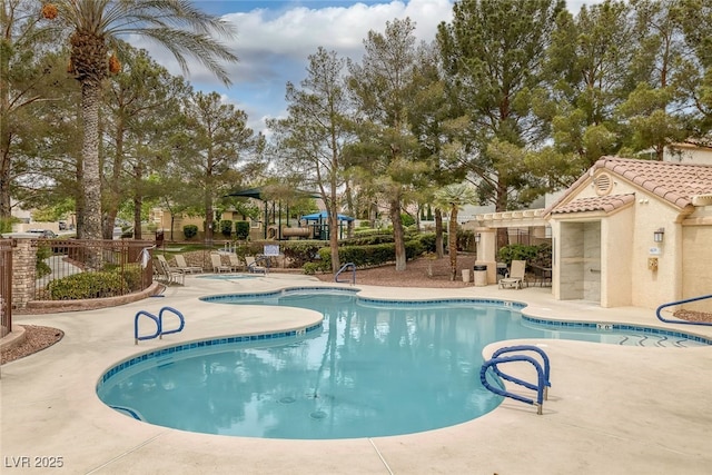 9705 Floweret Ave, Las Vegas, NV 89117 - community pool with a pergola and a patio