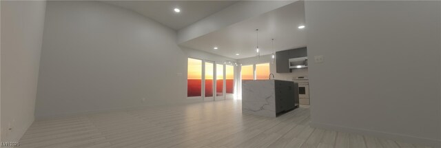 1280 S Yosemite Ave, Pahrump, NV 89048 - corridor featuring baseboards, light wood-style floors, and recessed lighting