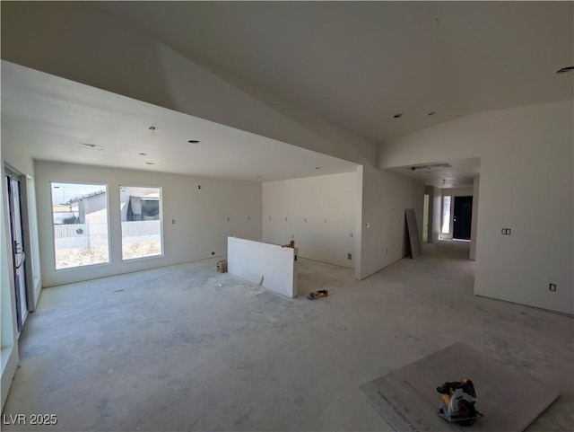 1280 S Yosemite Ave, Pahrump, NV 89048 - unfurnished living room featuring lofted ceiling