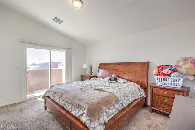 bedroom with access to outside, light colored carpet, lofted ceiling, and visible vents