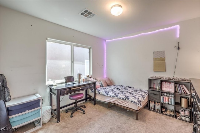 carpeted bedroom with visible vents