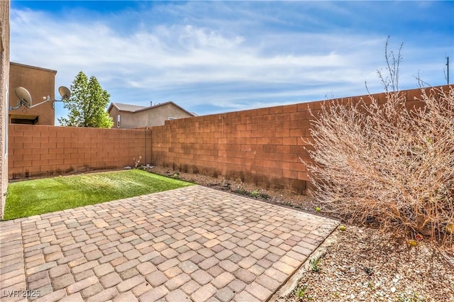 view of patio with a fenced backyard
