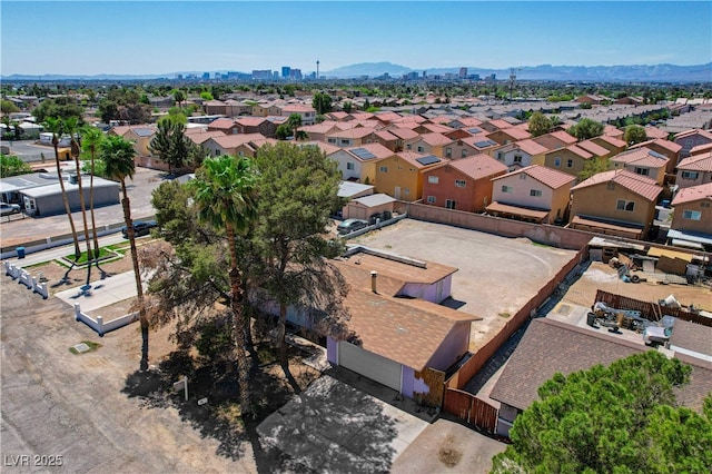 drone / aerial view featuring a mountain view and a residential view