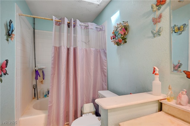bathroom with toilet and shower / bath combination with curtain