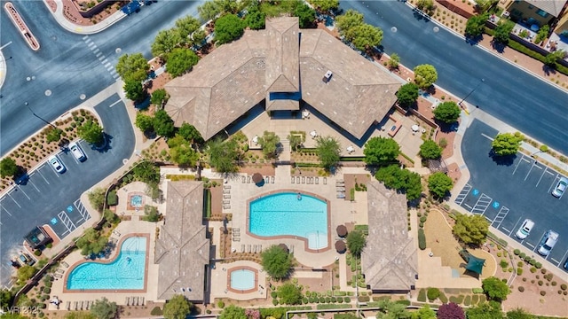 view of property location featuring a pool area