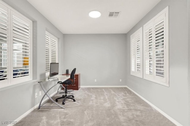 7806 Sundial Peak St, Las Vegas, NV 89166 - carpeted home office with healthy amount of natural light and baseboards