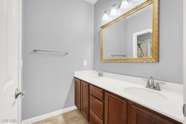 7806 Sundial Peak St, Las Vegas, NV 89166 - full bathroom with double vanity and baseboards