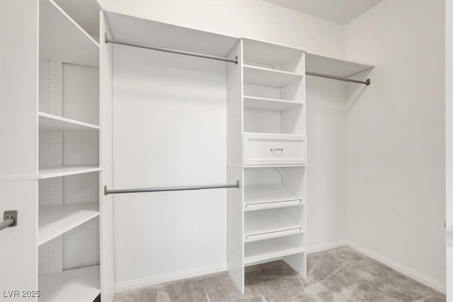 7806 Sundial Peak St, Las Vegas, NV 89166 - spacious closet featuring carpet