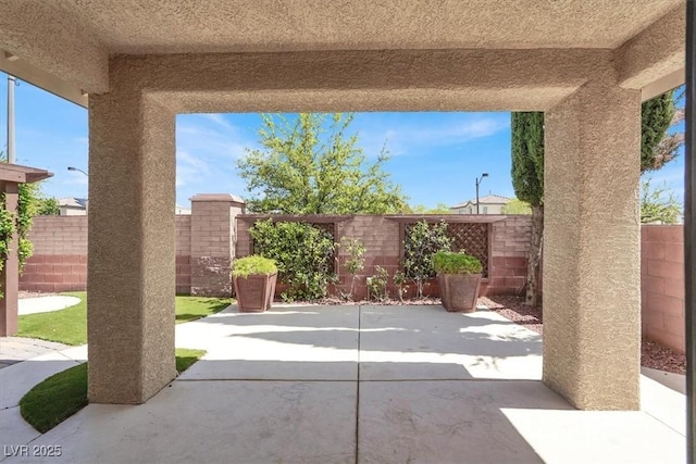 7806 Sundial Peak St, Las Vegas, NV 89166 - fenced backyard with a patio