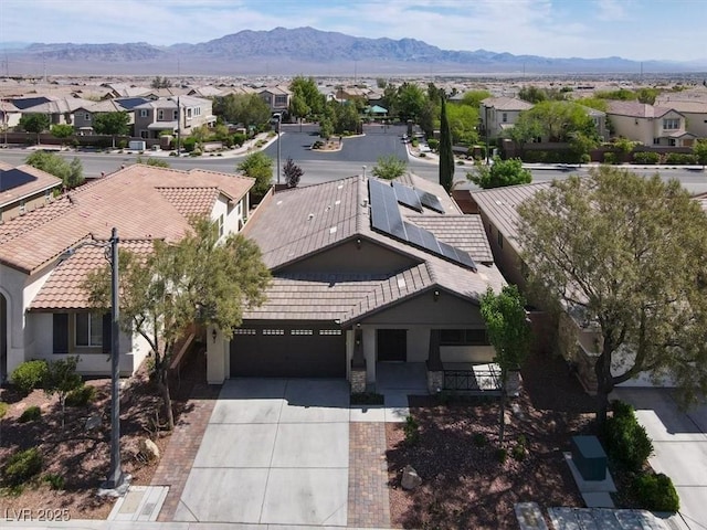 7806 Sundial Peak St, Las Vegas, NV 89166 - aerial view of residential area with a mountain backdrop